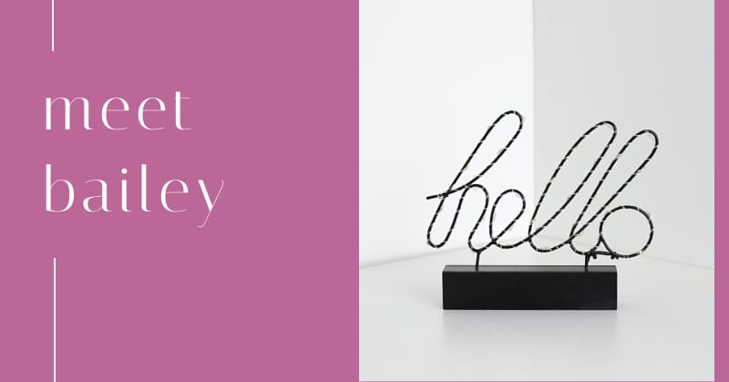 hello sign sitting on table